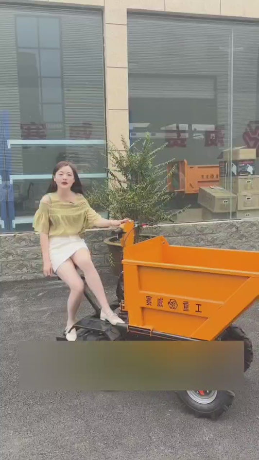 Электрический четырёхколёсный самосвал с ручным опрокидыванием и ковшом для инженерных работ